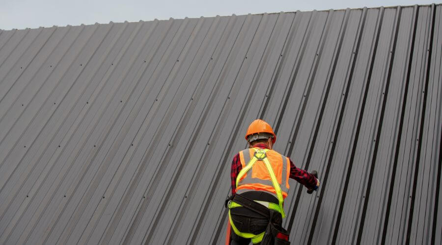 Professional metal roof installation services in Bartelso, IL
